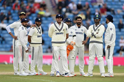 Indian team huddle before a Test match